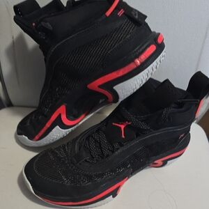 Jordan Black and Red Athletic Shoes with Jumpman Logo